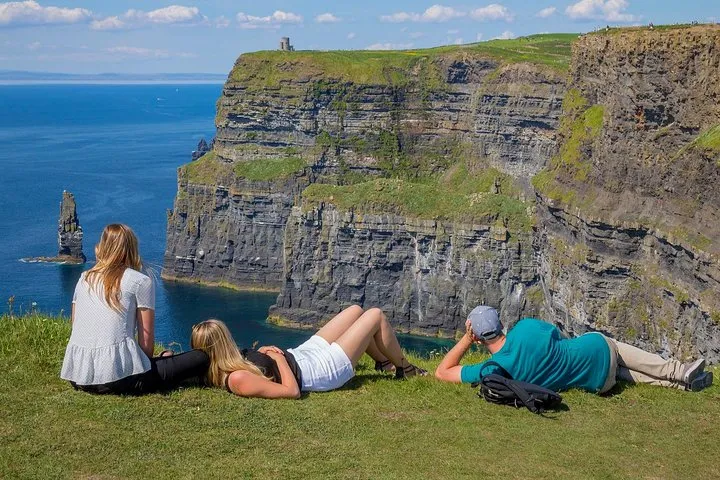 Coach on a Northern Ireland coastal road near the Giant's Causeway on a 6-day Ireland vacation tour