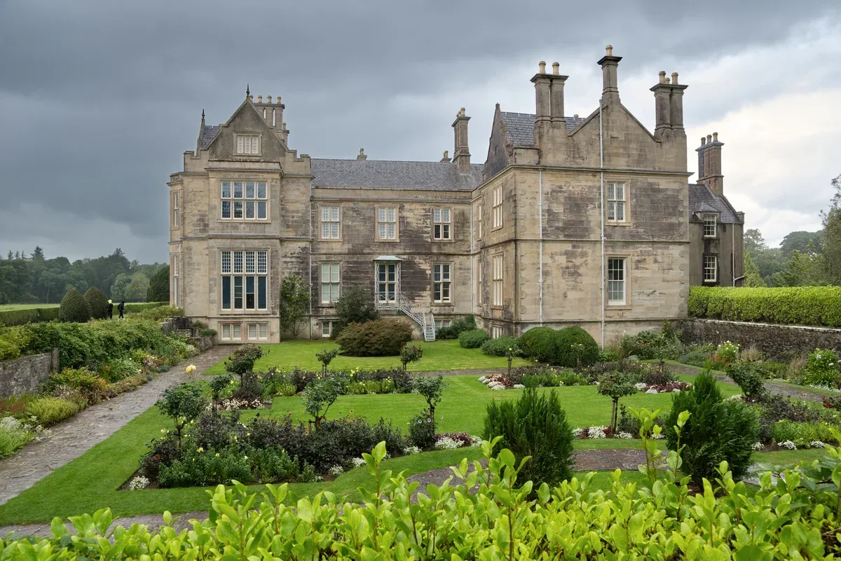 Muckross House and gardens in Killarney National Park on a vacation tours of Ireland route